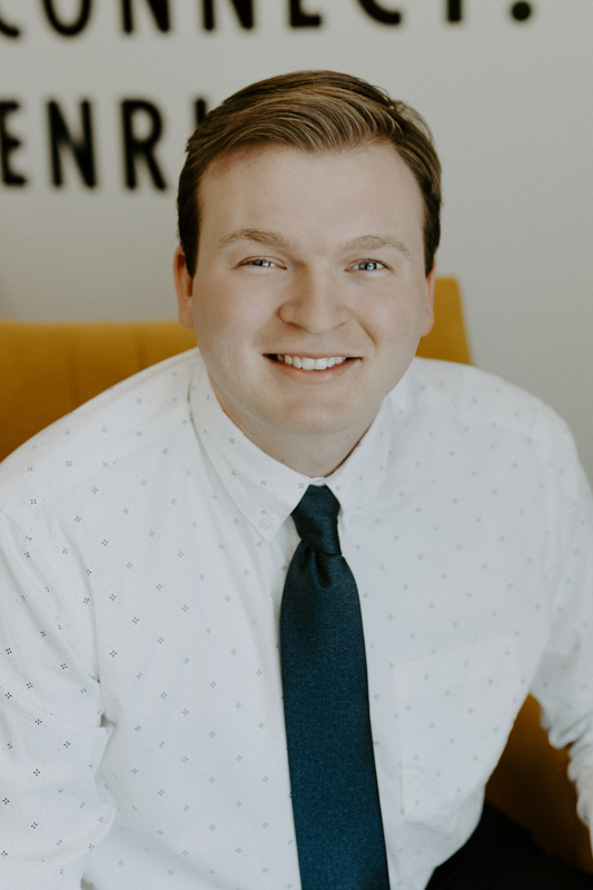 casey stickland headshot with tie