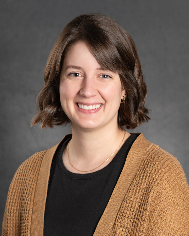 kirsten gjesdal headshot with sweater